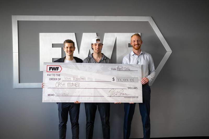 FWF team celebrating a promotion