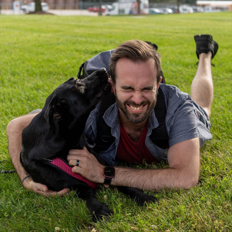 Aaron outside with his dog Zoey