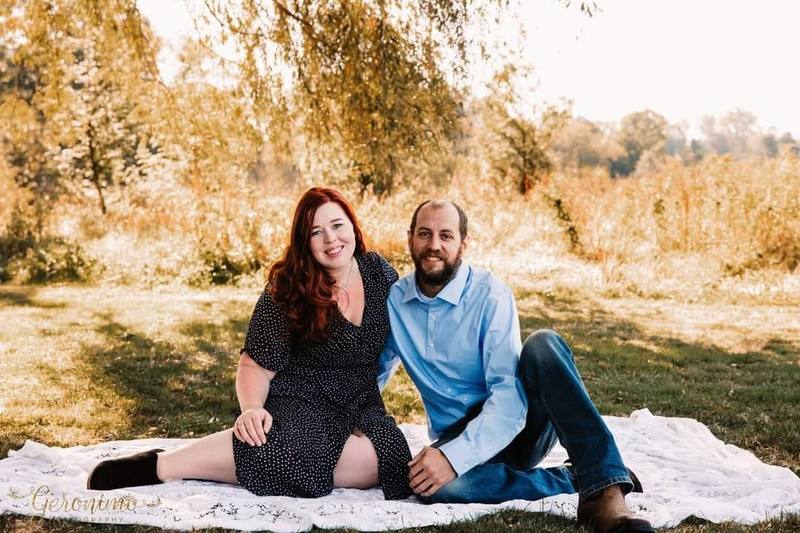 Krista and her husband outdoors in the snow